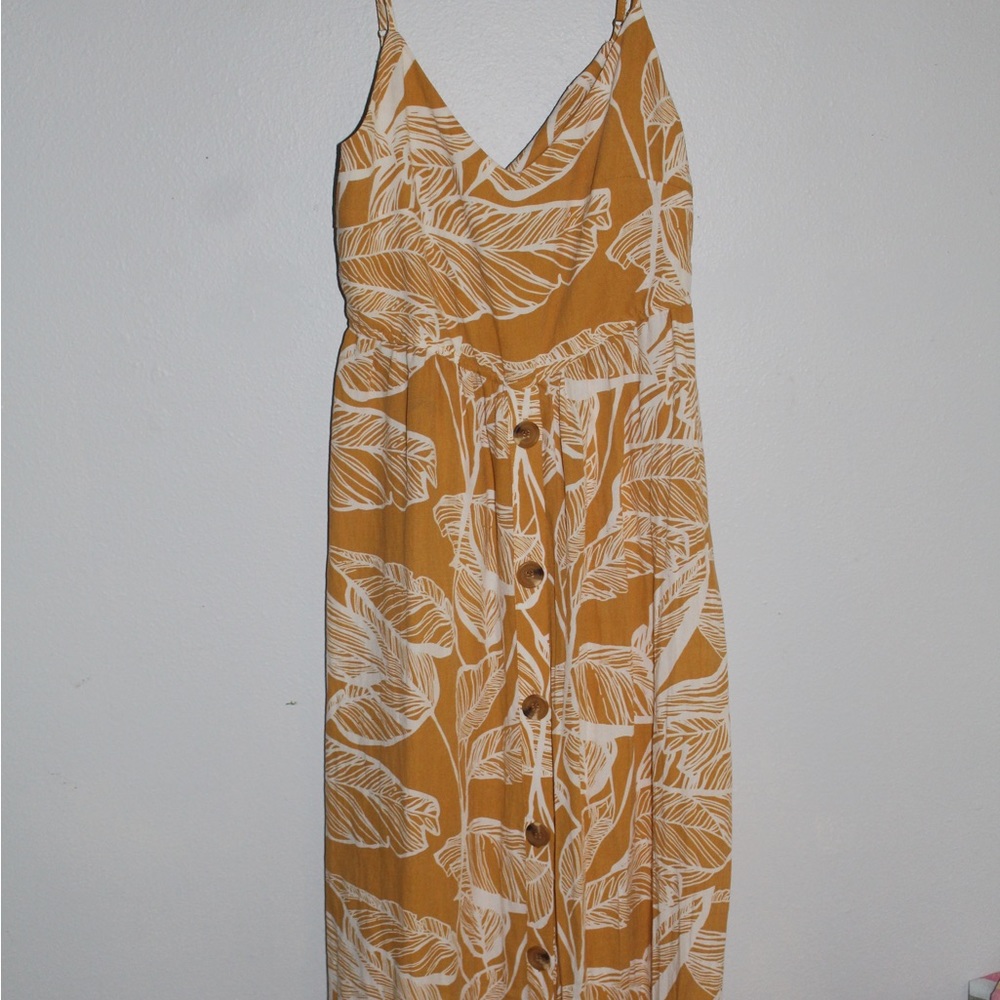 A long yellow floral dress